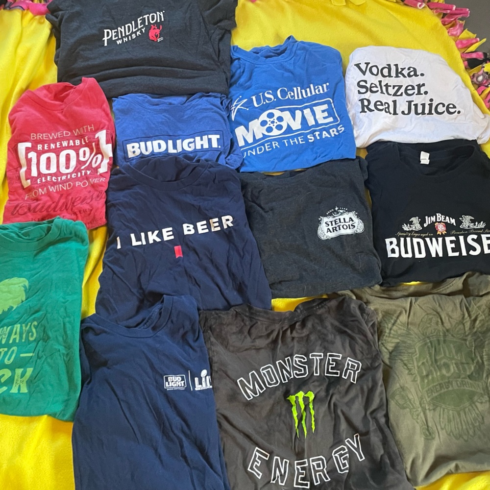 12 mixed size small and medium t shirts. Mix of colors and fabrics. Beer/liqueur